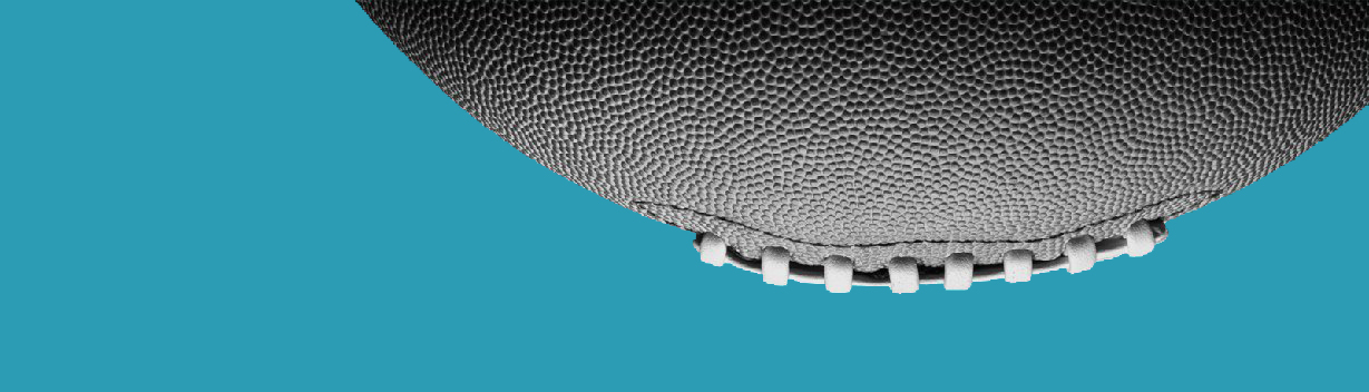 A football on a teal background