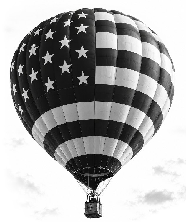 A hot air balloon with stars and stripes rising